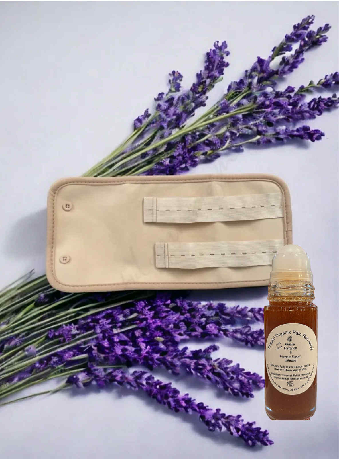 BLISSFUL ORGANIX CASTOR OIL & CAYENNE PAIN RELIEF ROLLER W/ COMPRESS